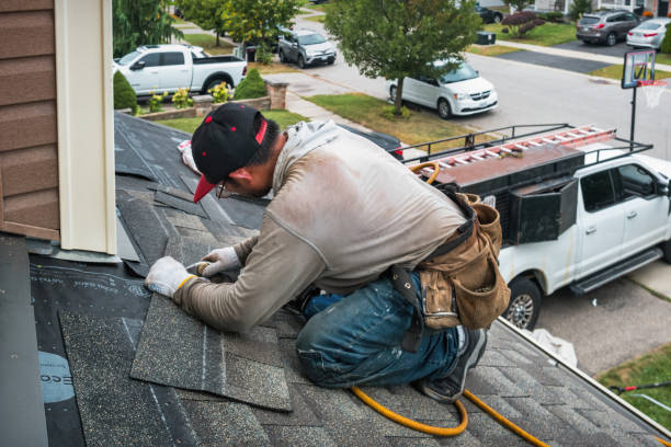 Professional Roofing technician working in La Quinta, CA